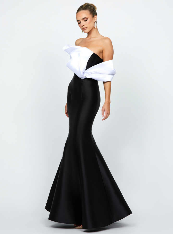 statement black gown with contrasted white ruffle bodice and off shoulder sleeve