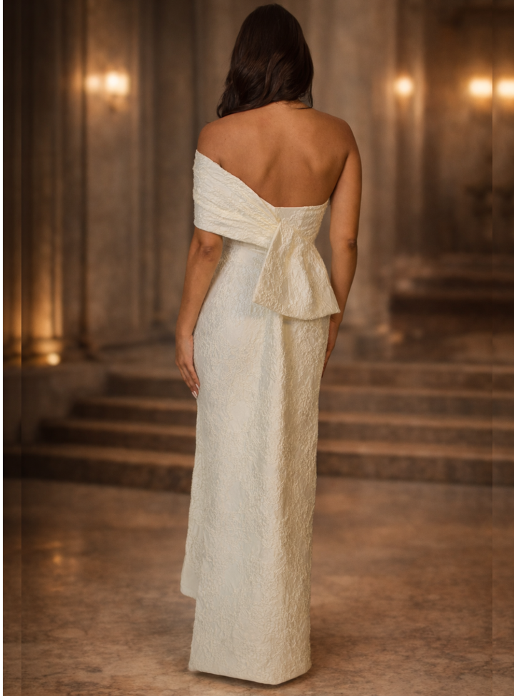 Ivory engagement dress with dramatic draping on the back