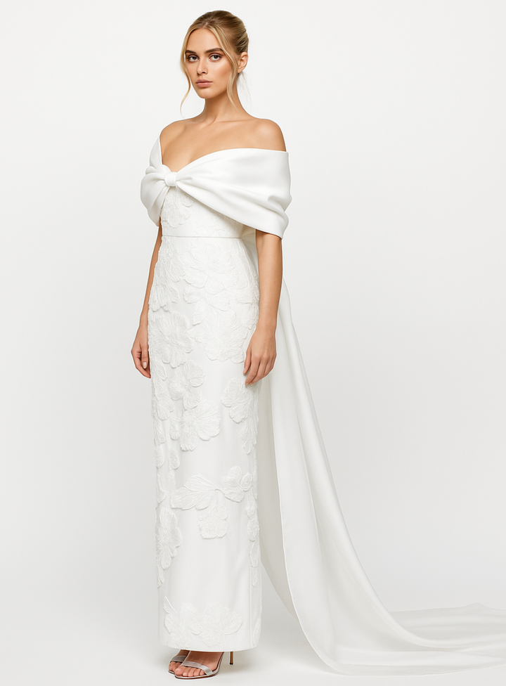 bridal gown with off shoulder chiffon detailing and train