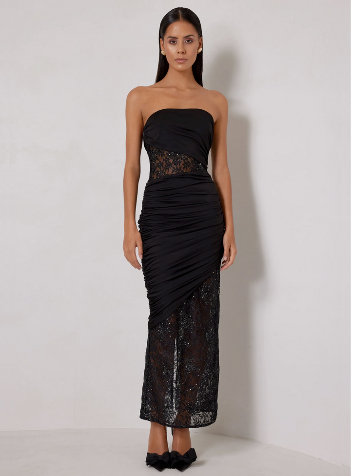 little black jersey dress for a chic wedding guest