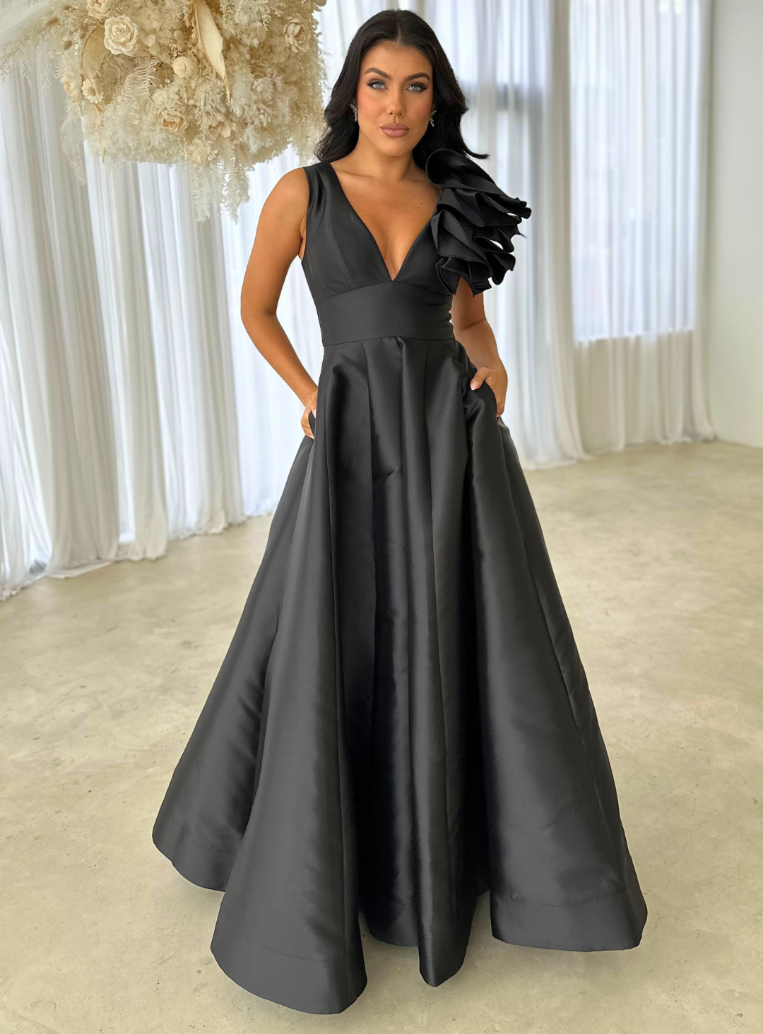 black v neck gown with a-line skirt for a wedding