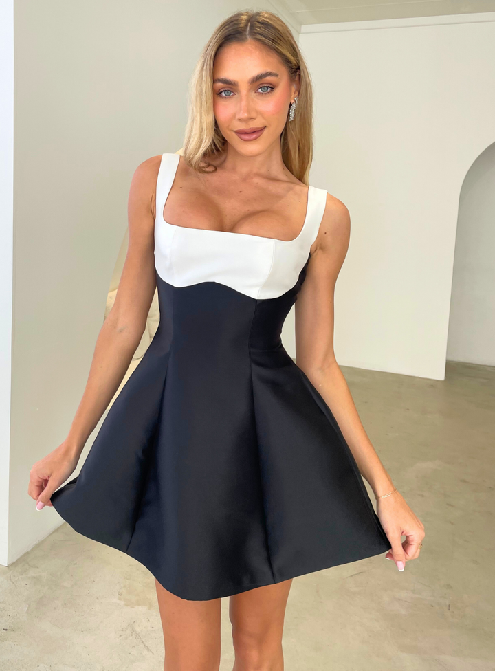 Black and white mini dress for wedding guests