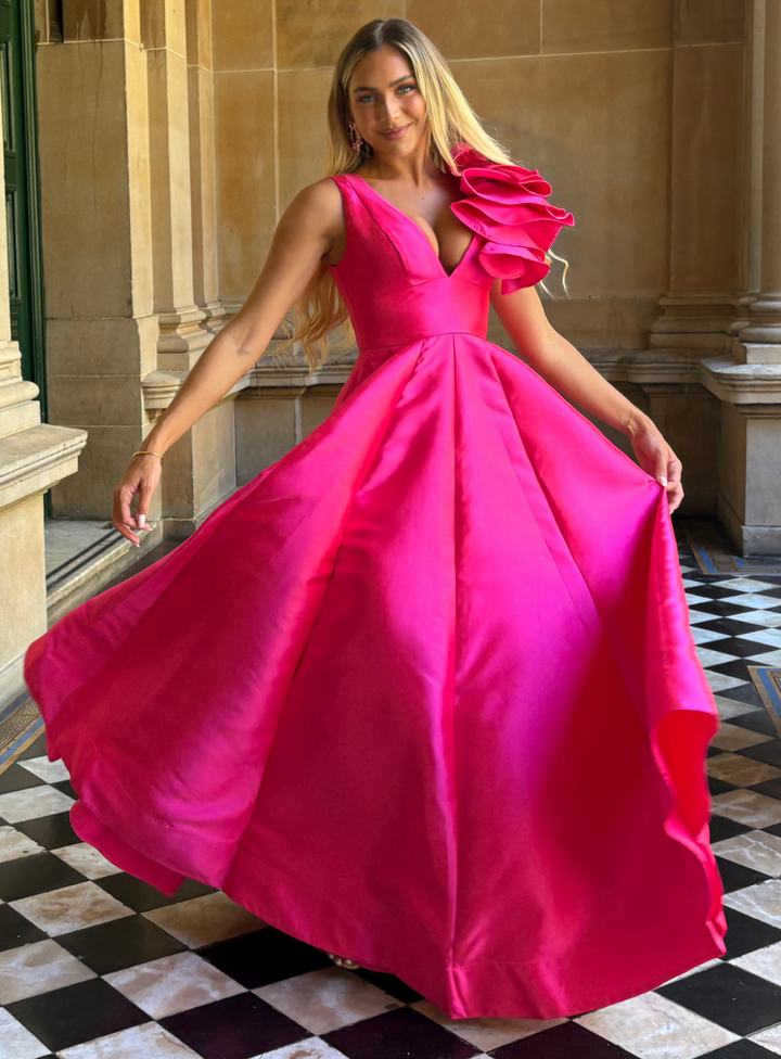 stunning fuschia pink v-neck bariano dress with a flared a-line skirt