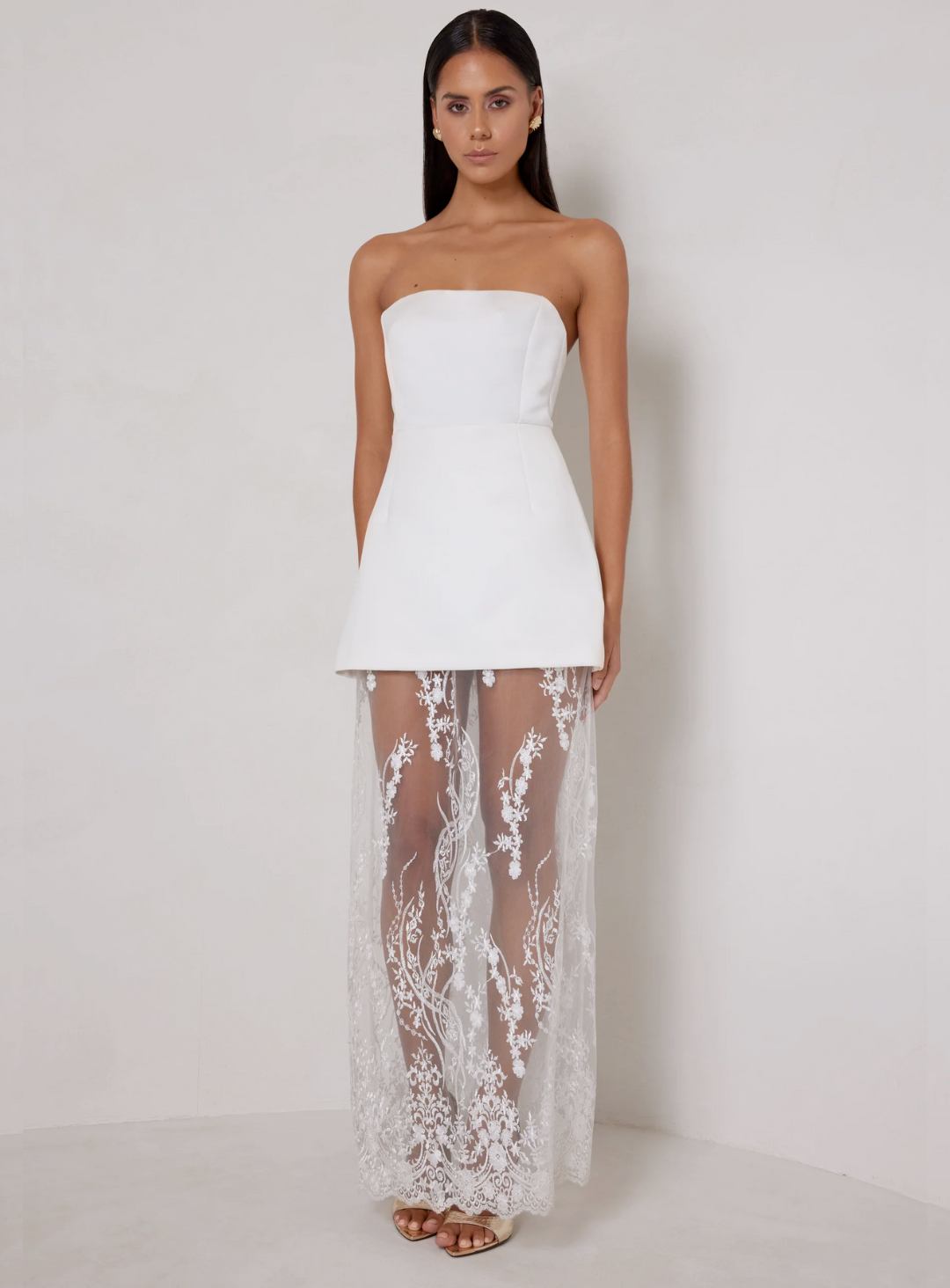 strapless white mini dress with lace detailing to make it a maxi dress